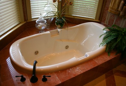 Bathtub plumbing by Glenn's Plumbing Services.